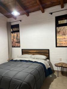 Letto o letti in una camera di Cabaña El Encanto