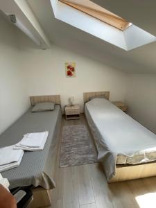 Postel nebo postele na pokoji v ubytování Casa Dima