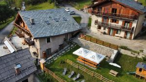 an aerial view of a house and a house at La Maison. Il Nido dell'Aquila in Bardonecchia