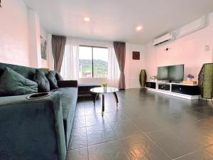 Posezení v ubytování Hotel Baya Phuket
