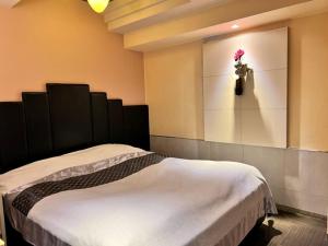 Hotel Opus -Adult only-房間的床