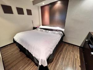 Hotel Opus -Adult only-房間的床