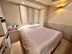 Hotel Opus -Adult only-房間的床