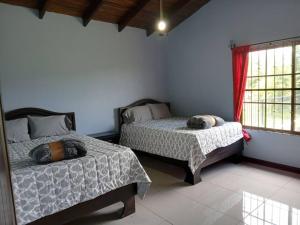 Een bed of bedden in een kamer bij Casa Verde.