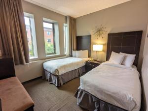 Postel nebo postele na pokoji v ubytování King Edward Hotel
