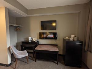 TV a/nebo společenská místnost v ubytování King Edward Hotel