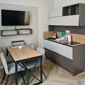 Η κουζίνα ή μικρή κουζίνα στο KONDOR apartmani +32 φωτογραφίες