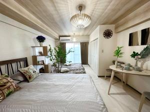 Giường trong phòng chung tại shibuya center -Max 5p-家庭公寓-车站7分-直达新宿涉谷六本木银座