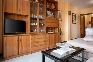 Μια τηλεόραση ή/και κέντρο ψυχαγωγίας στο AT128 Cerca del centro, playa a 10 min a pie