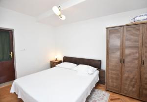 Postel nebo postele na pokoji v ubytování Apartment Miledina