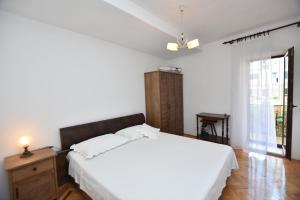 Postel nebo postele na pokoji v ubytování Apartment Miledina
