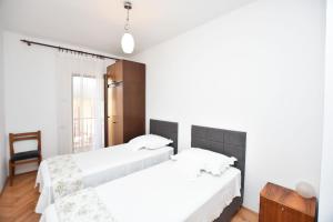 Postel nebo postele na pokoji v ubytování Apartment Miledina