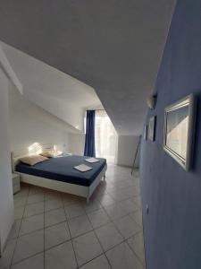 Кровать или кровати в номере Villa Kairos
