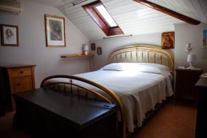 Postel nebo postele na pokoji v ubytování MAGIA & EMOZIONI - Trecastagni- Falde ETNA Villa vista mare