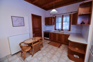 Kuchyň nebo kuchyňský kout v ubytování Villa Koliri