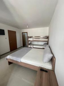 a bedroom with a bed in a room at Hotel Majestic in Struga