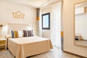 Postel nebo postele na pokoji v ubytování tent Torremolinos