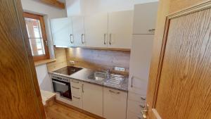 Η κουζίνα ή μικρή κουζίνα στο Apartment Daxauer
