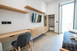 Postel nebo postele na pokoji v ubytování Astroom apartments + 33 fotografií