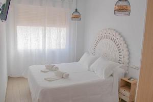 Cama o camas de una habitación en H Rincón de Diego