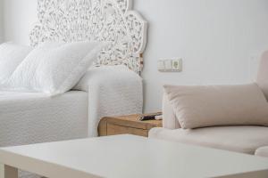 Cama o camas de una habitación en H Rincón de Diego