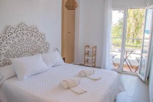 Cama o camas de una habitación en H Rincón de Diego