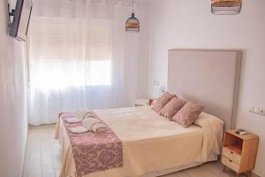 Cama o camas de una habitación en H Rincón de Diego