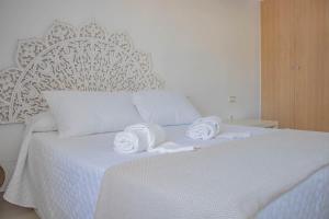 Cama o camas de una habitación en H Rincón de Diego
