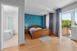 Postel nebo postele na pokoji v ubytování Minerva Hotel