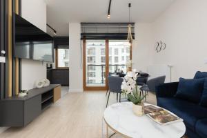 Posedenie v ubytovaní Pozytywny Mokotów Apartment with Balcony Warsaw by Noclegi Renters