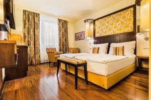 Uma cama ou camas num quarto em Hotel Savannah