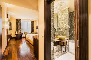Uma cama ou camas num quarto em Hotel Savannah