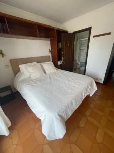 Postel nebo postele na pokoji v ubytování 1ra Linea Platja de Sant Feliu