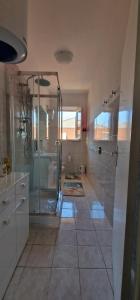 Kúpeľňa v ubytovaní Casa Ilanfra - appartamenti Gabbiano, Farfalla e Stella Marina