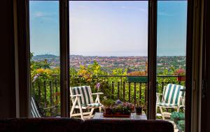 Balkón nebo terasa v ubytování MAGIA & EMOZIONI - Trecastagni- Falde ETNA Villa vista mare