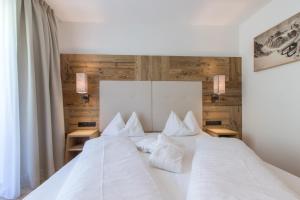 Postel nebo postele na pokoji v ubytování Hotel Stoeres - Active wellbeing