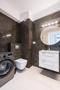 Ett badrum på ViaPipera apartments I Pipera blvd