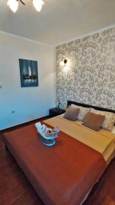 Postelja oz. postelje v sobi nastanitve Apartments Aleksandra