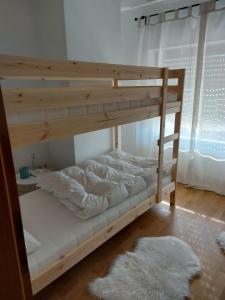 a bunk bed in a room with a bunk bedutenewayangering at Ferienwohnung Scheer 
