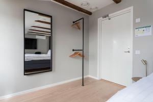 Postel nebo postele na pokoji v ubytování Hotell MAVI