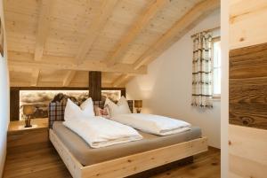 Łóżko lub łóżka w pokoju w obiekcie Dosserhof