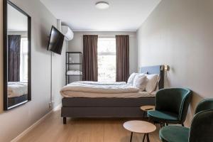 Postel nebo postele na pokoji v ubytování Hotell MAVI