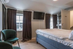 Postel nebo postele na pokoji v ubytování Hotell MAVI