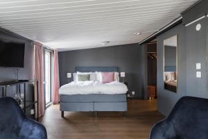 Postel nebo postele na pokoji v ubytování Hotell MAVI