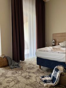 Posteľ alebo postele v izbe v ubytovaní Hotel Nosal Ski & Wine