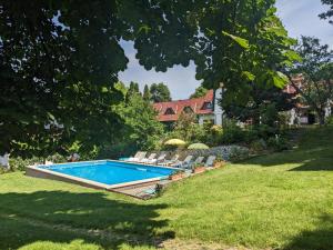 Bazén v ubytovaní Guest house Magyar Route 66 alebo v jeho blízkosti