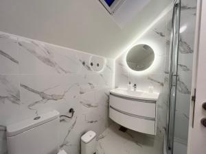 Koupelna v ubytování Apartman Mala plaža 2 + 37 fotografií
