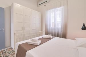 Postel nebo postele na pokoji v ubytování Casa dei Nonni