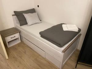 Postel nebo postele na pokoji v ubytování Apartmán Pod Mandloní