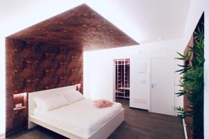Postel nebo postele na pokoji v ubytování B&B Butterfly Suite